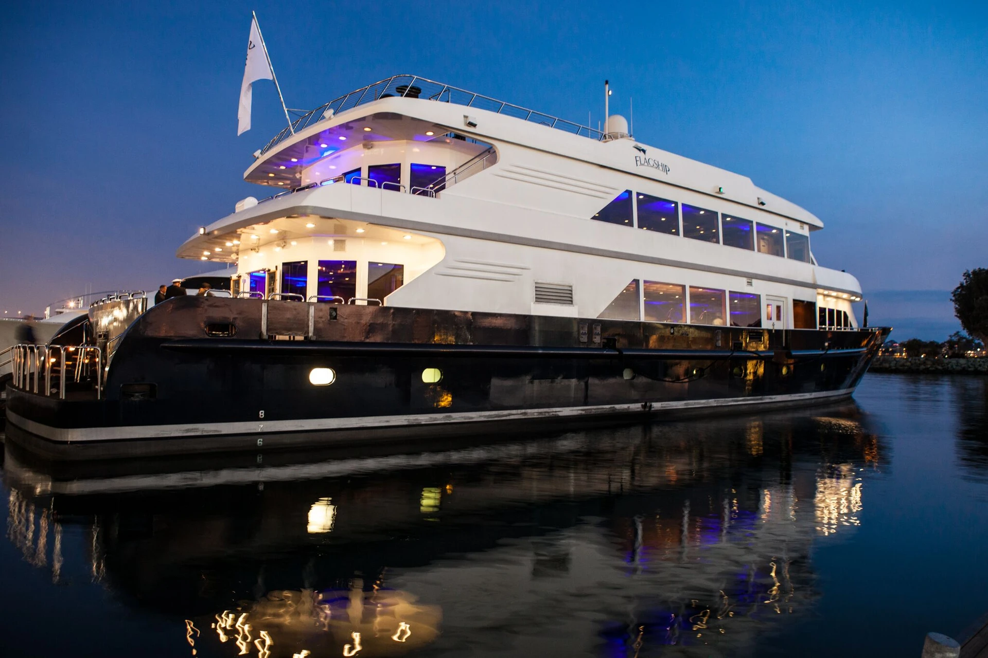 Flagship Cruises yacht charter at a dock on the San Diego bay.