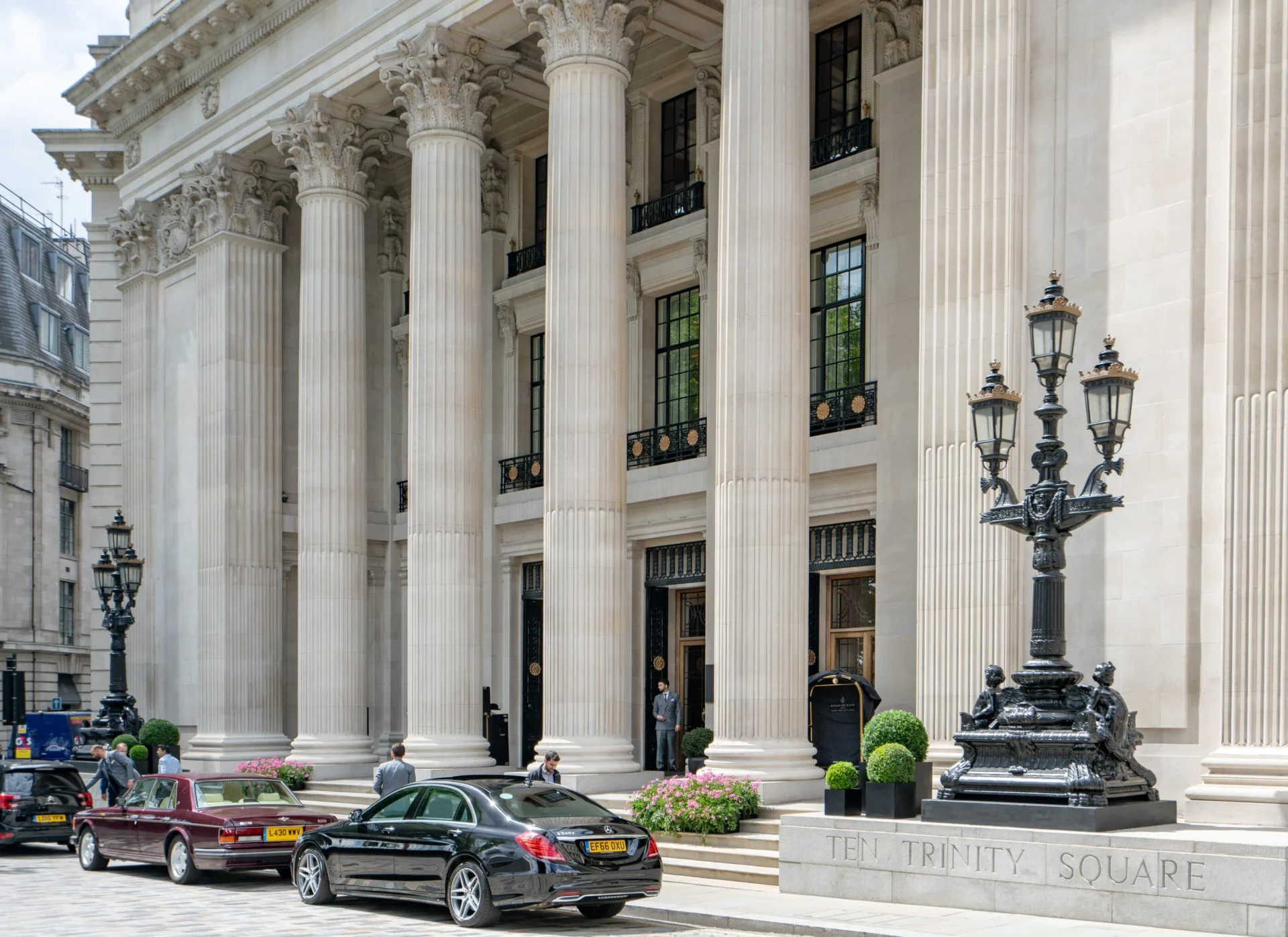 Ten Trinity's grand columns in front of the lobby entrance.