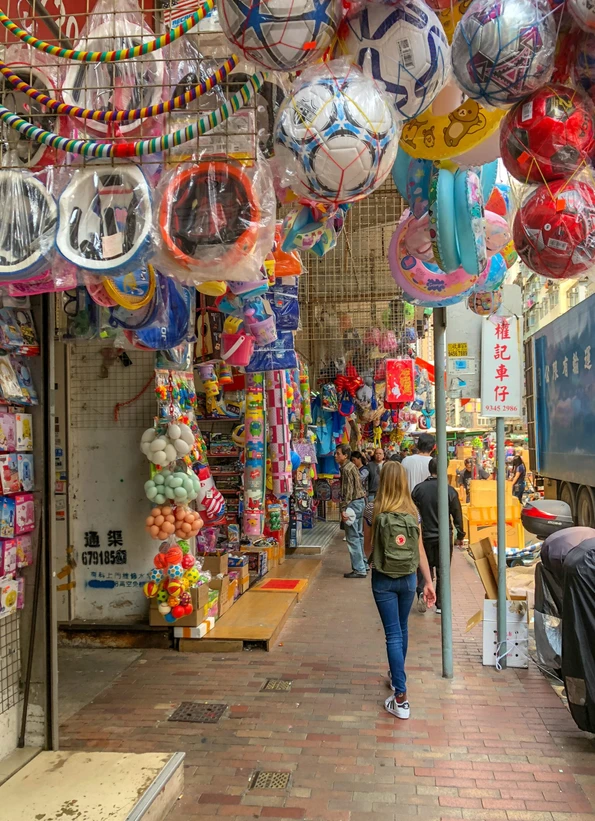 My daughter shopping on Fuk Wing Street in Hong Kong