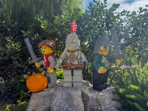 Pumpkins placed near Lego figures in Castle Hill.