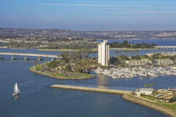 The Hyatt Regency Mission Bay exterior surrounded by water and the marina.