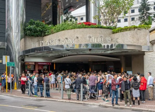 People line up at the Lower Terminus for The Peak Tram near Hong Kong Park.