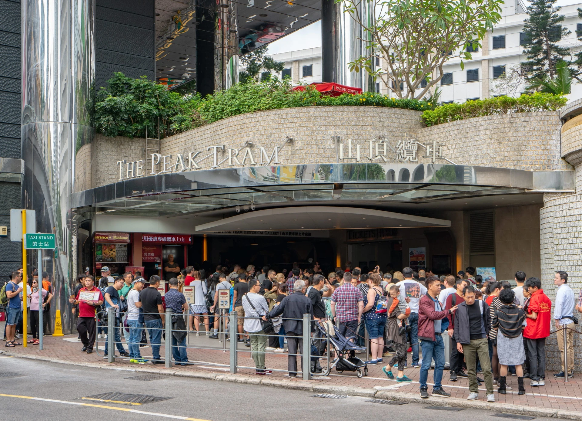 People line up at the Lower Terminus for The Peak Tram near Hong Kong Park.