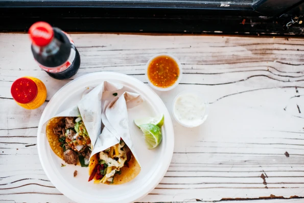 A plate of tacos and a Coke at Taco Stand restaurant in La Jolla.