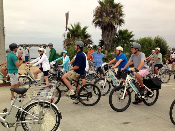 A group rides electric bikes on a tour, a fun things to do in San Diego with teens.