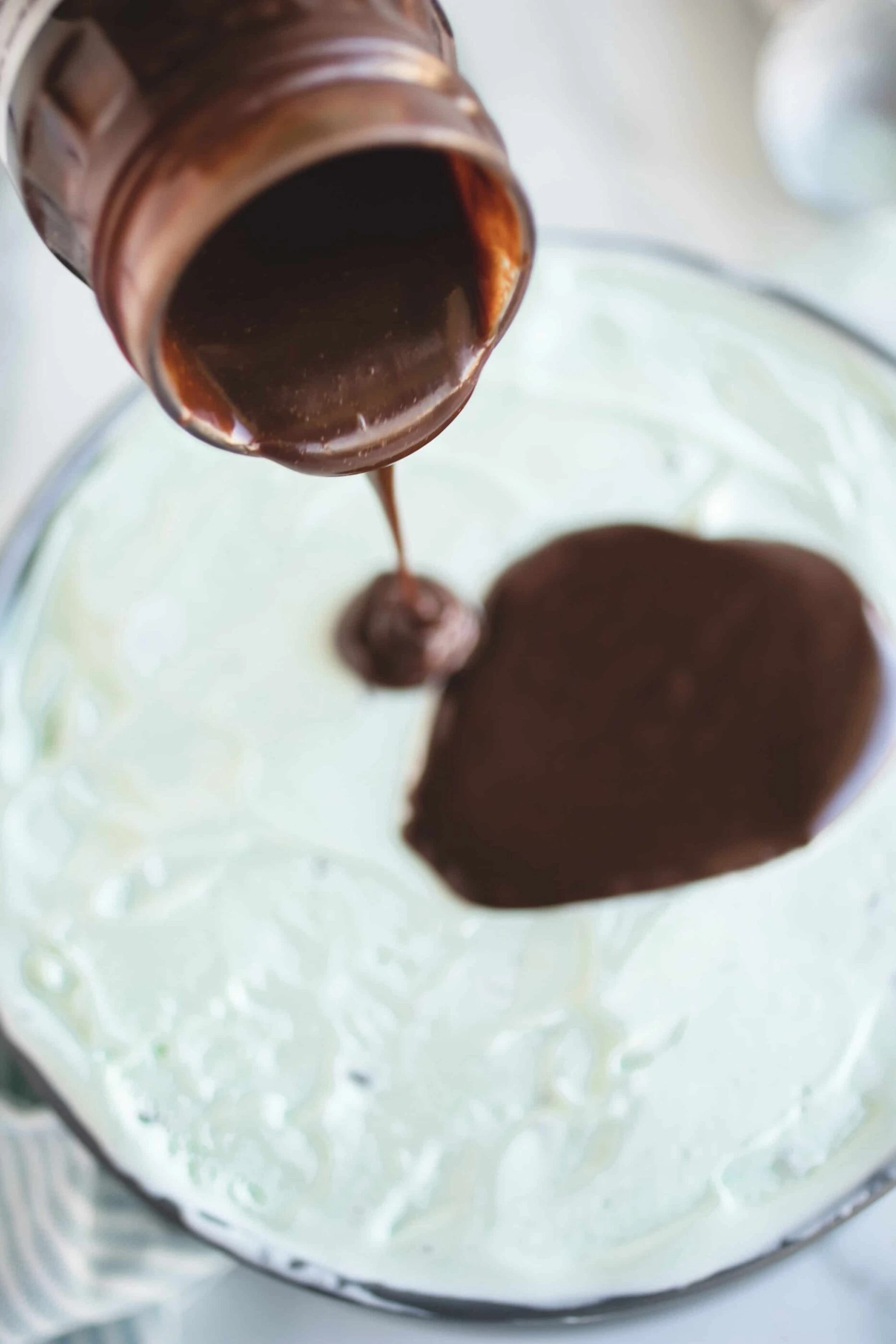 Use chocolate sauce on Girl Scout cookies ice cream pie recipe.