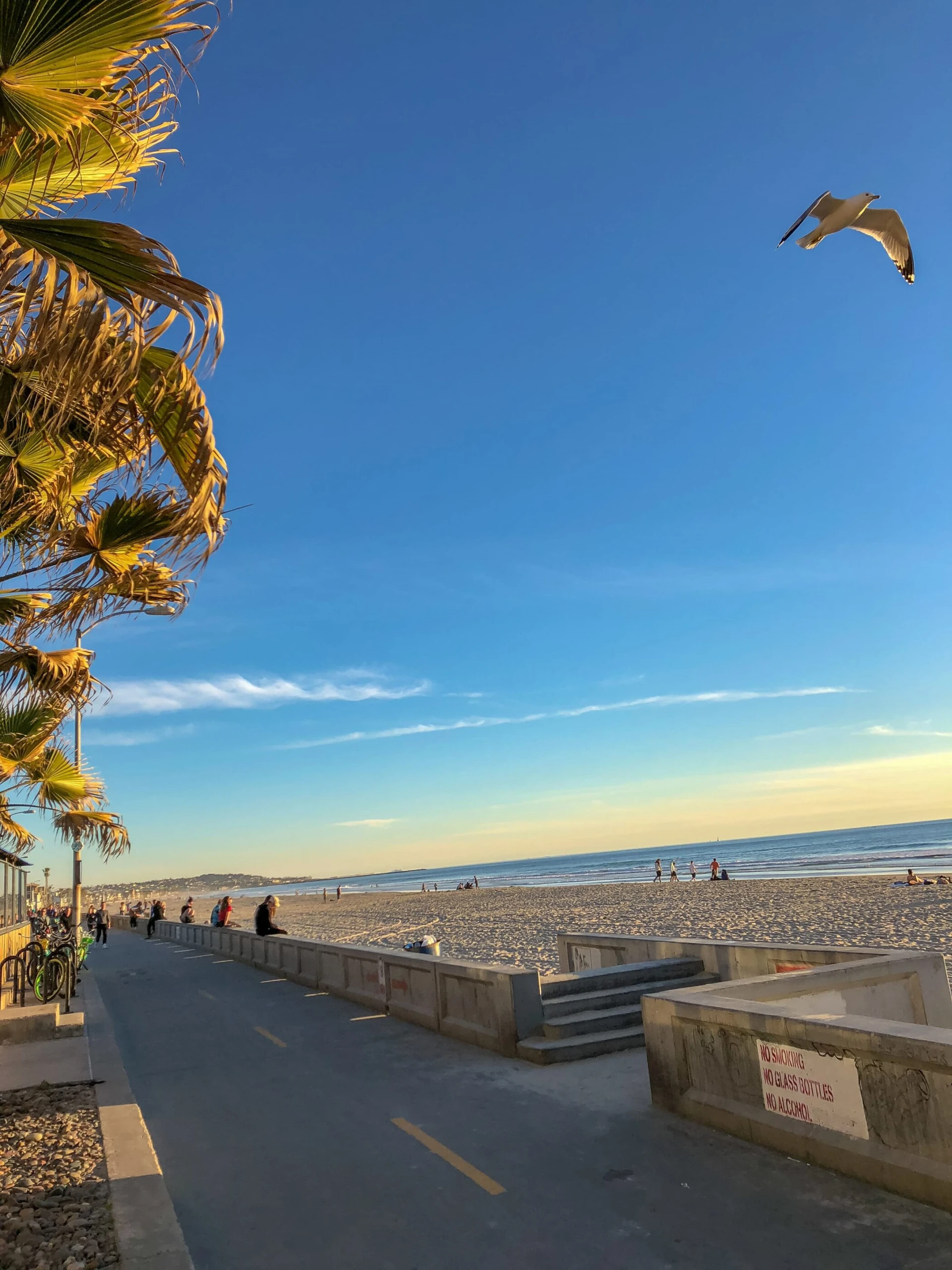 The Pacific Beach boardwalk during golden hour in San Diego