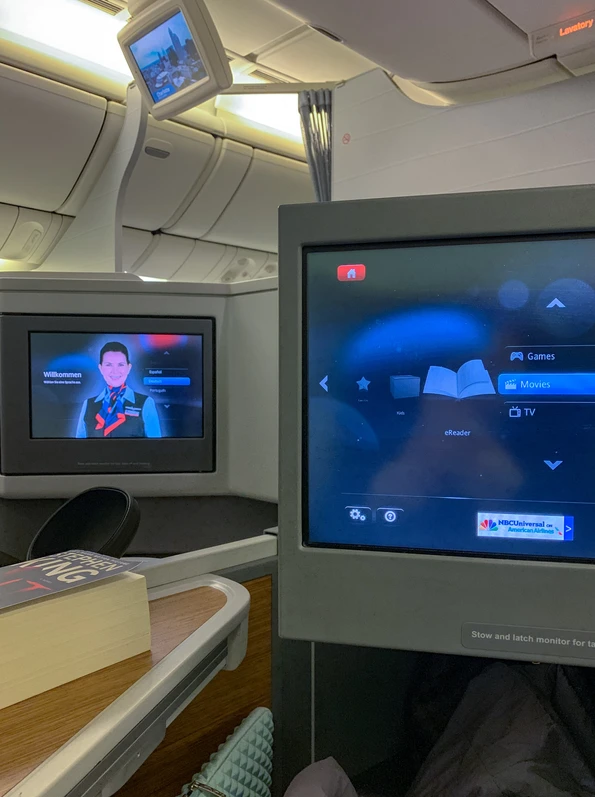 In-flight entertainment screens on American Airlines business class from LAX to HKG