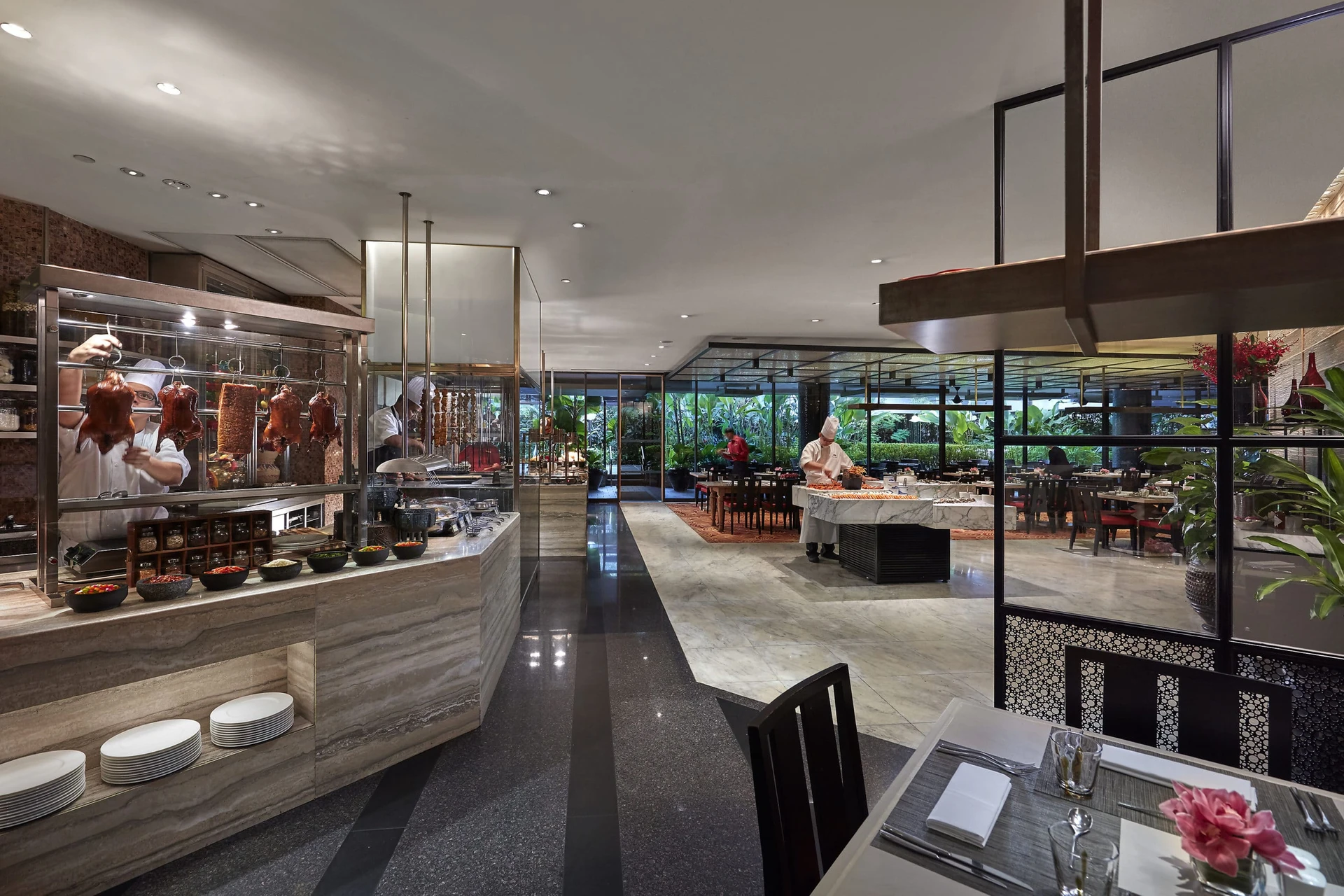 Mandarin Oriental, Singapore's Melt Cafe buffet stations and dining room.