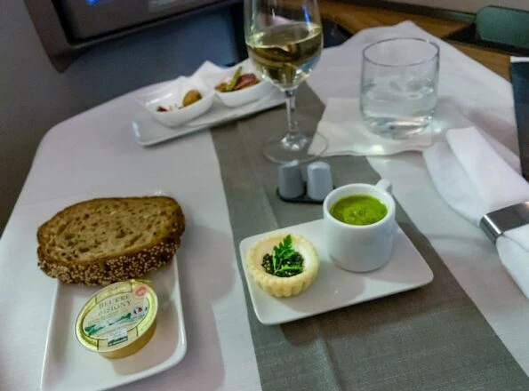 Tart with caviar and kale soup on American Airlines flight 182 first class from HKG-LAX