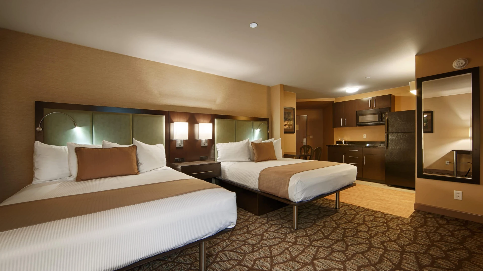 Double bedroom interior with kitchenette