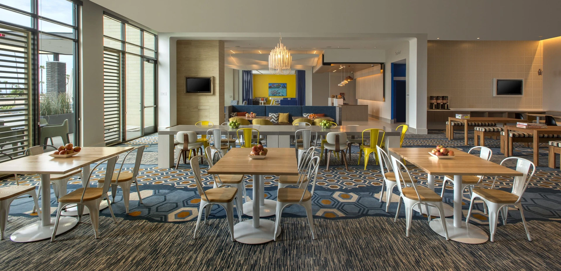 First floor dining room with tables and chairs