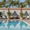 A shot over the pool to the cabanas