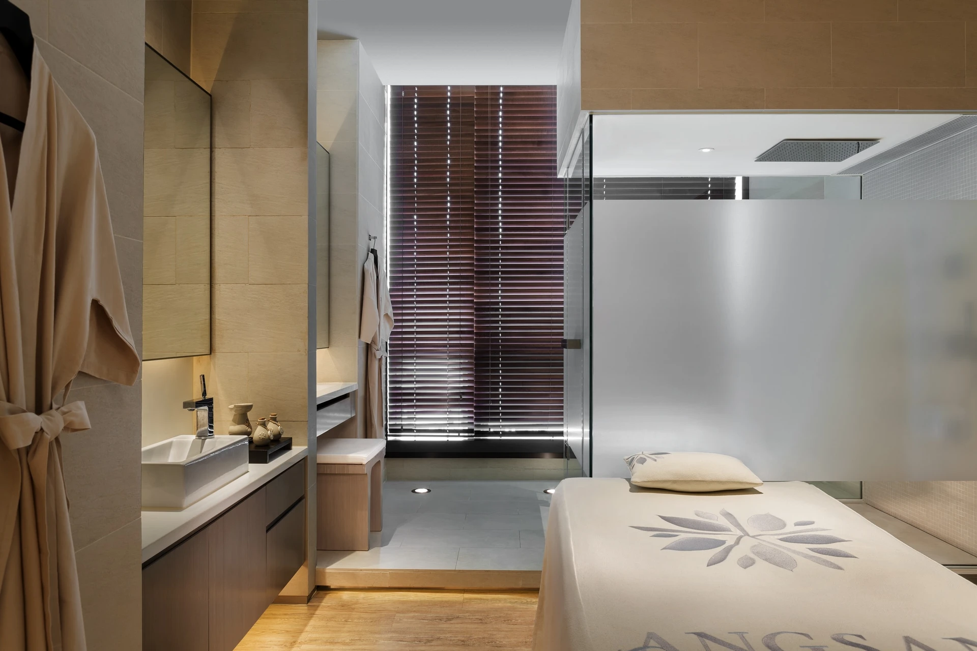 A single treatment room interior at Angsana Spa inside Hotel Icon Hong Kong.