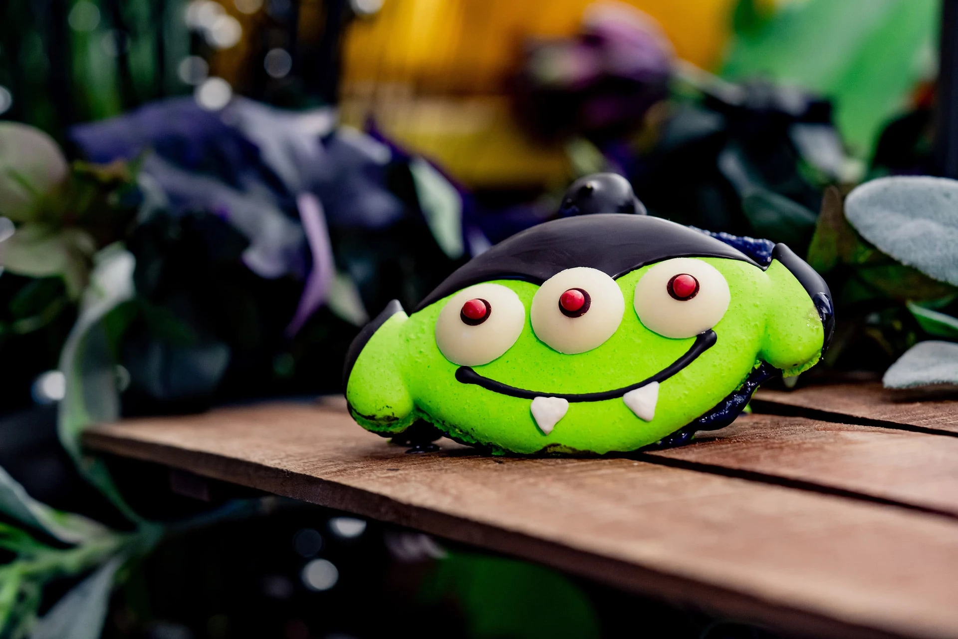 Disneyland Halloween food includes a vampire alien macaron