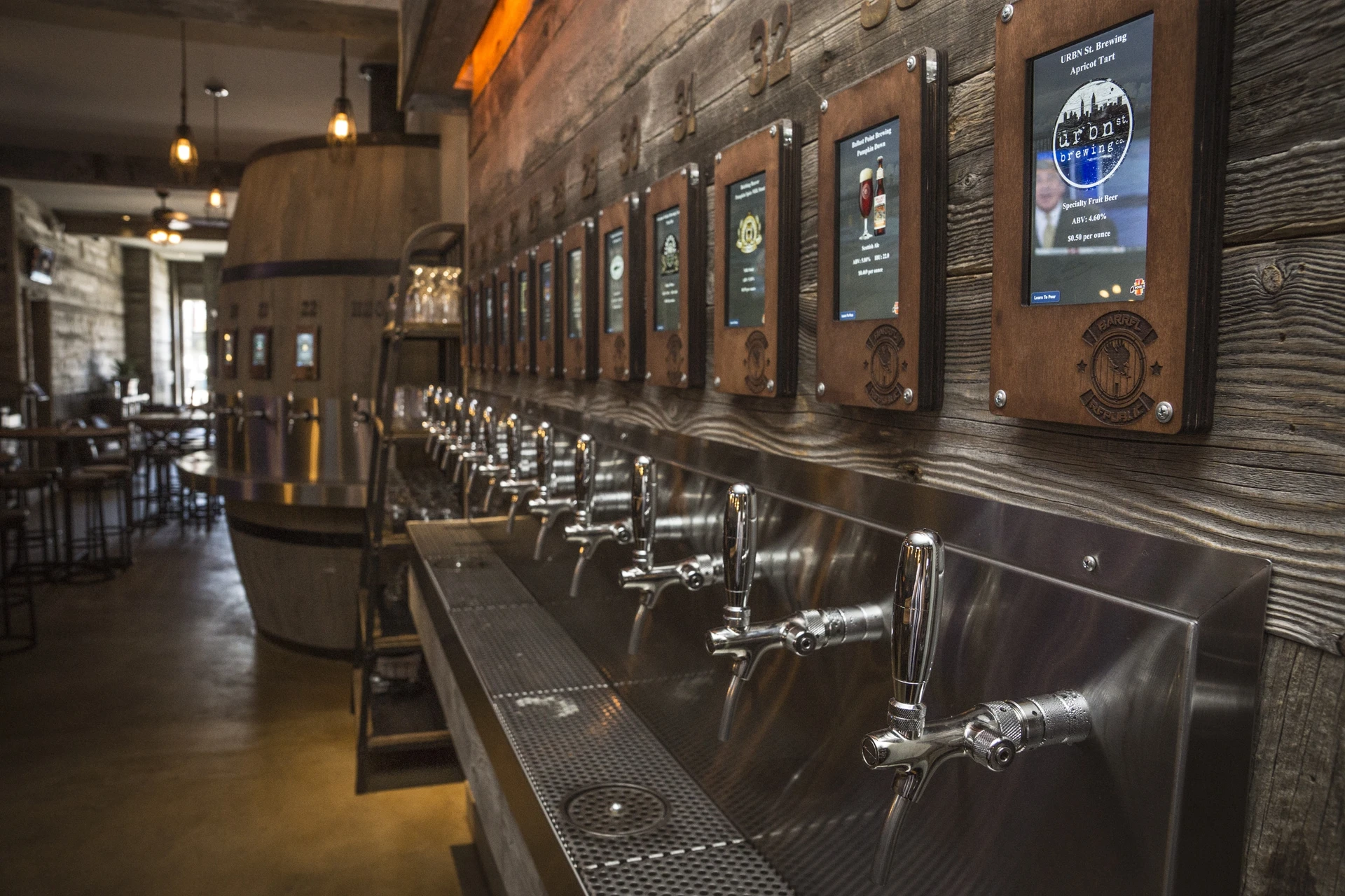 Side view of some of the 40 taps guests can pull from while sampling beer.