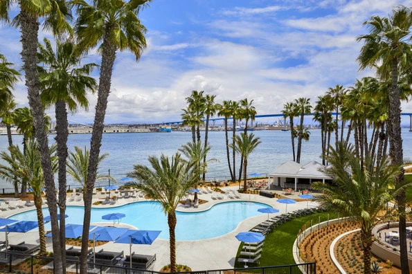 The outdoor pool overlooking the San Diego Bay and Coronado Bridge on a sunny day.