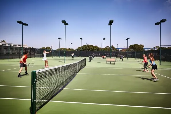 Guests play tennis at Coronado Island Marriott