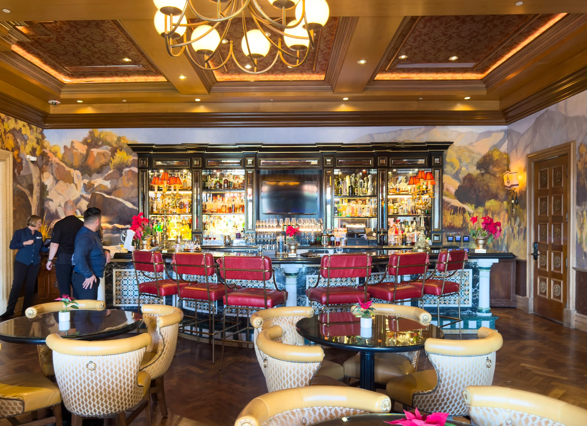 Waitstaff prepare the bar area in the Lobby Lounge at Fairmont Grand Del Mar.