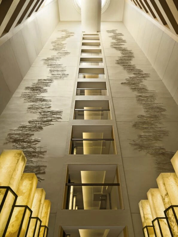 Upper House Hong Kong's interior atrium with multi-story art up the walls