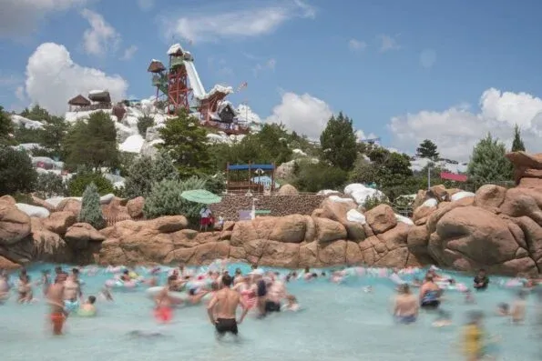 Guests splash around in the one-acre wave pool, Melt-Away Bay, at Disney's Blizzard Beach Water Park in Orlando, Florida.