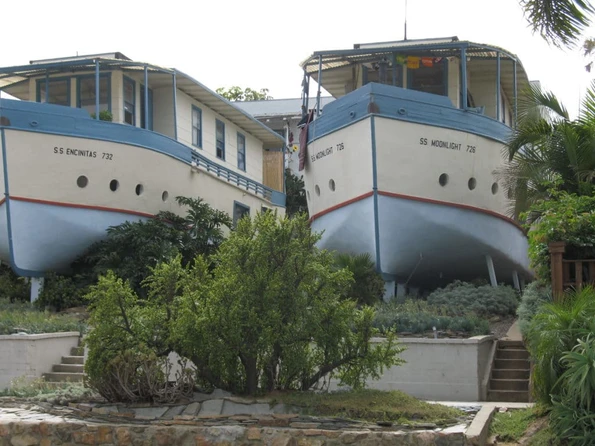 The SS Moonlight and SS Encinitas boathouses on a residential street.