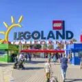 A family walks into the entrance of LEGOLAND California theme park.