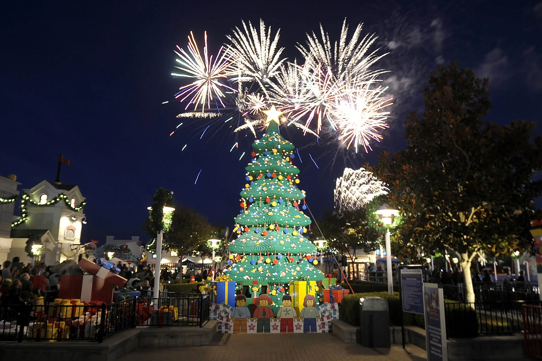 Fireworks on display above the LEGO Christmas tree.
