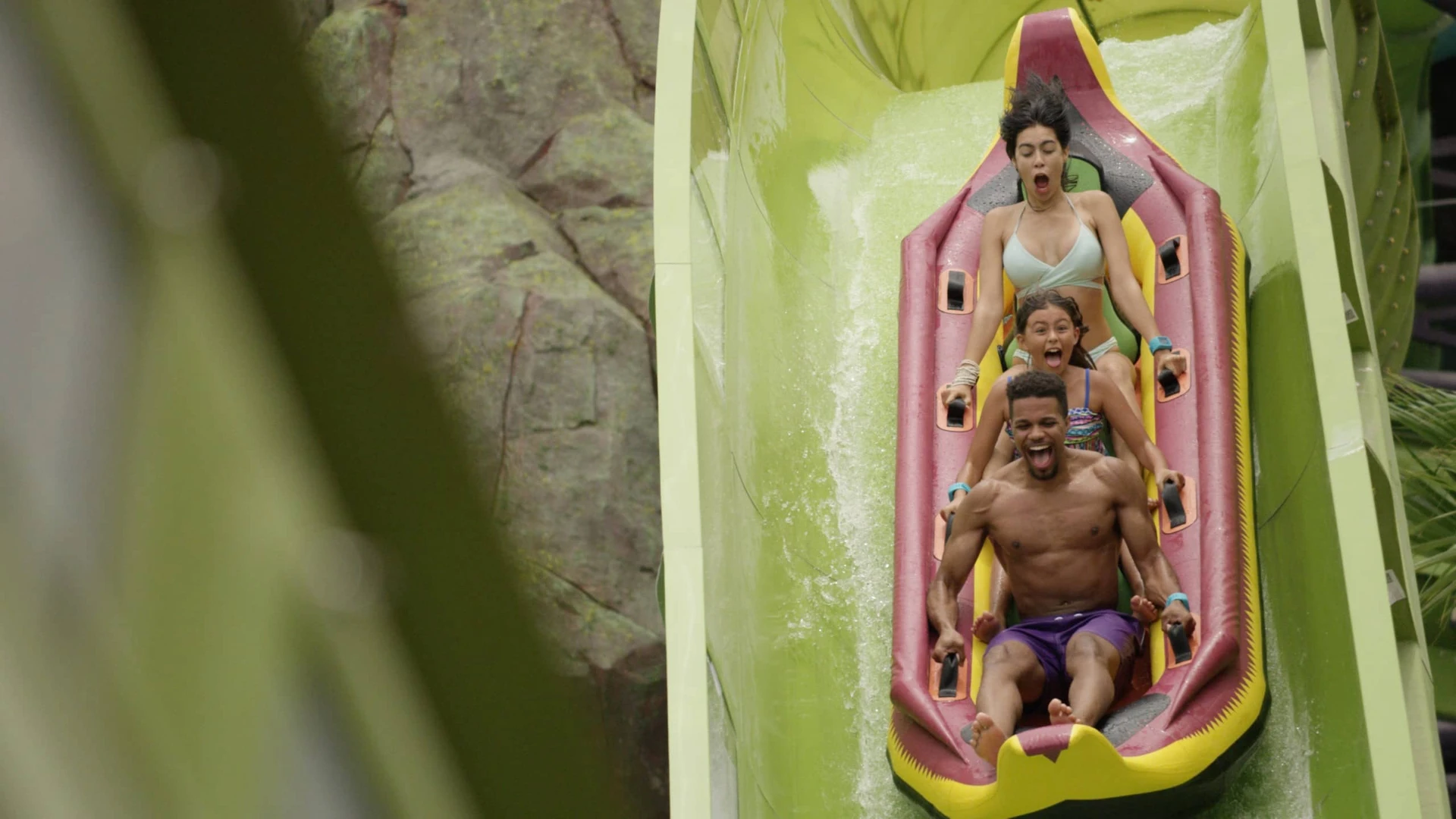 A group hurls down a water slide at Universal's Volcano Bay.