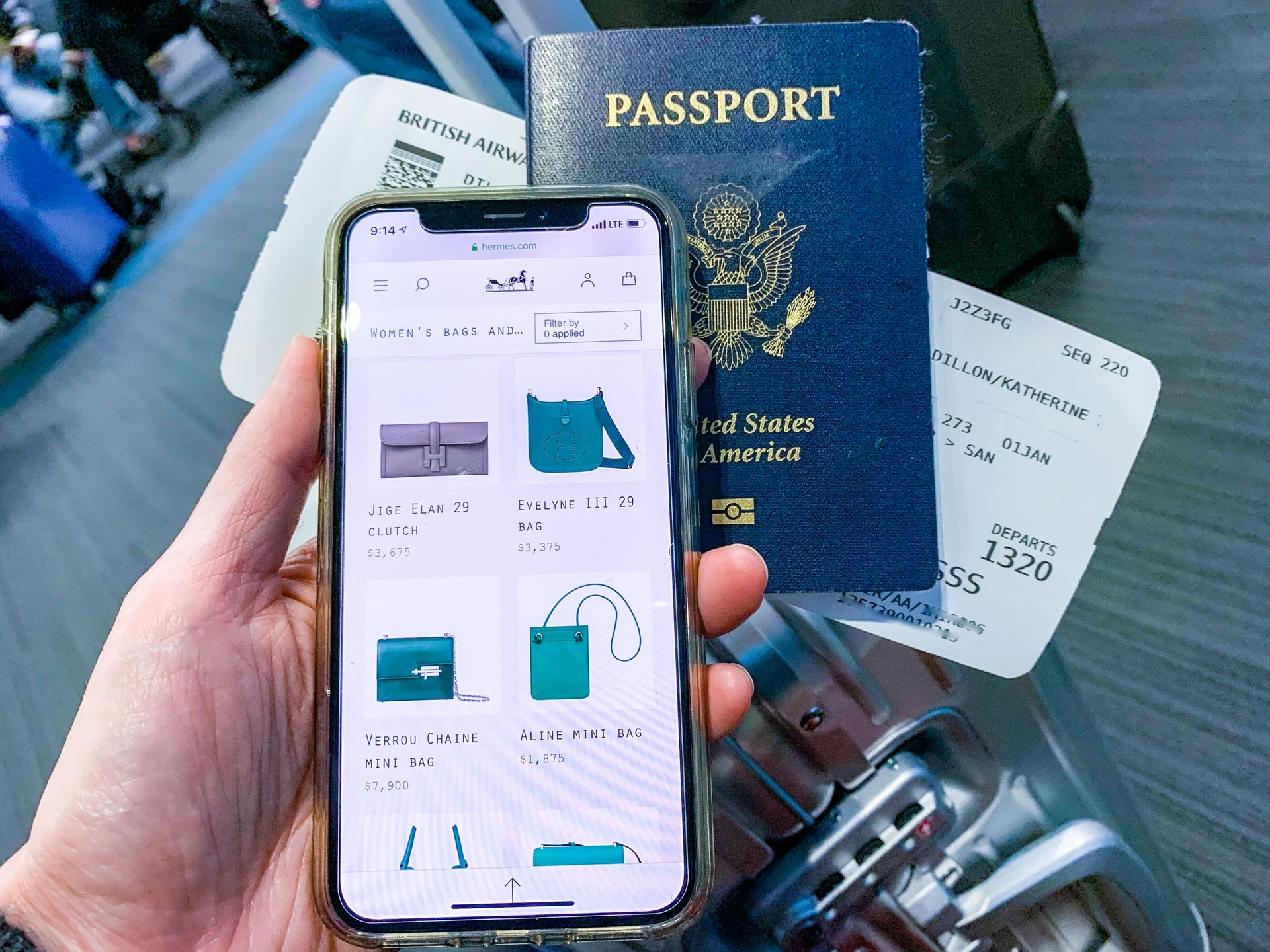 Me looking up the cost of a Hermes handbag on an mobile phone while at the Istanbul airport.