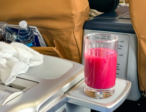 Pomegranate juice served as a predeparture drink in EgyptAir business class to Cairo from Athens.