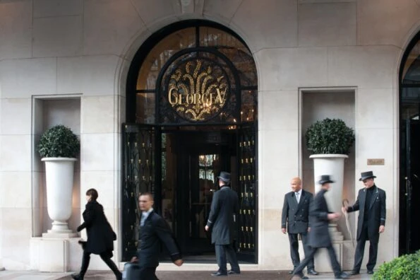 Doormen in front of the Four Seasons Paris entrance.