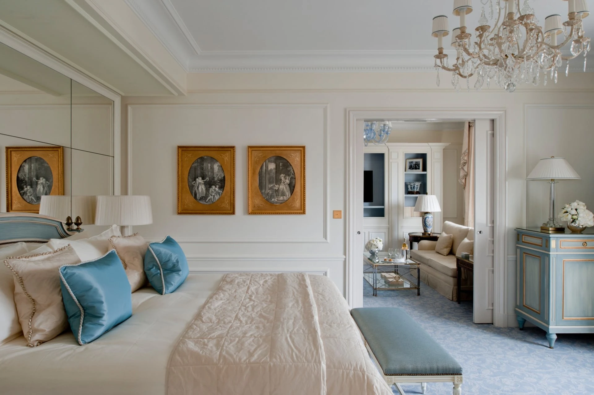 The pale blue and neutral decor inside the Four Seasons Suite at Four Seasons George V in Paris.
