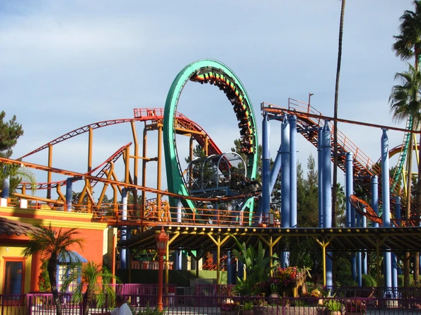 A roller coaster car navigates the upside-down loop on Montezooma's Revenge.