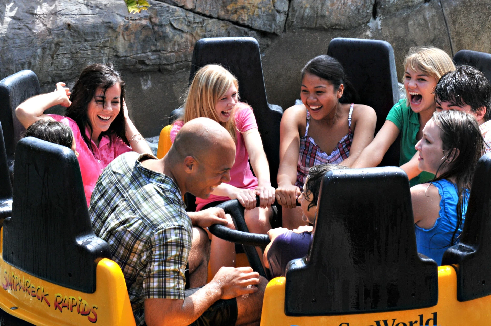A group in a Shipwreck Rapids raft at SeaWorld San Diego.
