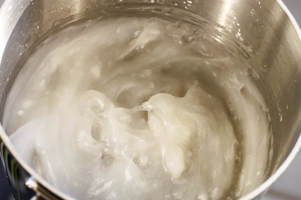 Cornstarch recipe thickening in a pan before food coloring is applied.