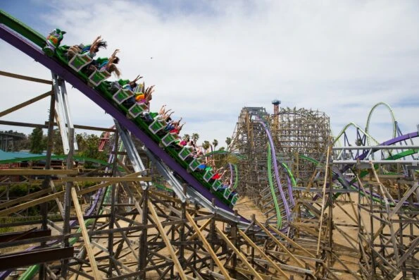 A roller coaster goes down a track at Six Flags Discovery Kingdom