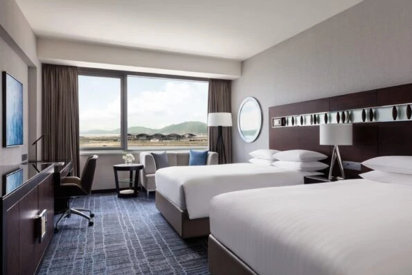 A renovated twin room at Hong Kong SkyCity Marriott, a Hong Kong family hotel near the airport.