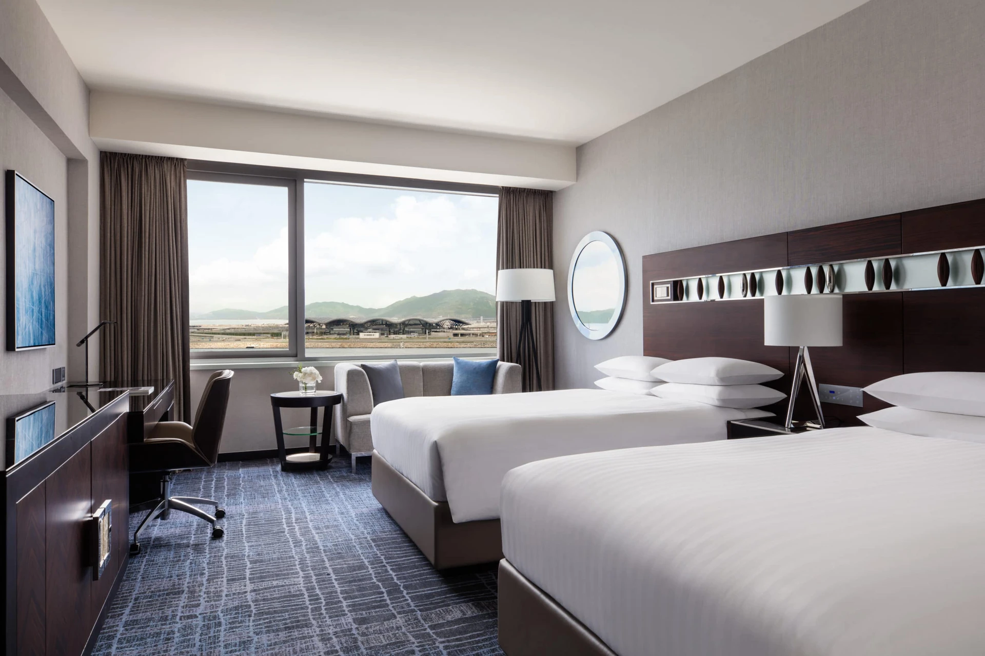 A renovated twin room at Hong Kong SkyCity Marriott, a Hong Kong family hotel near the airport.