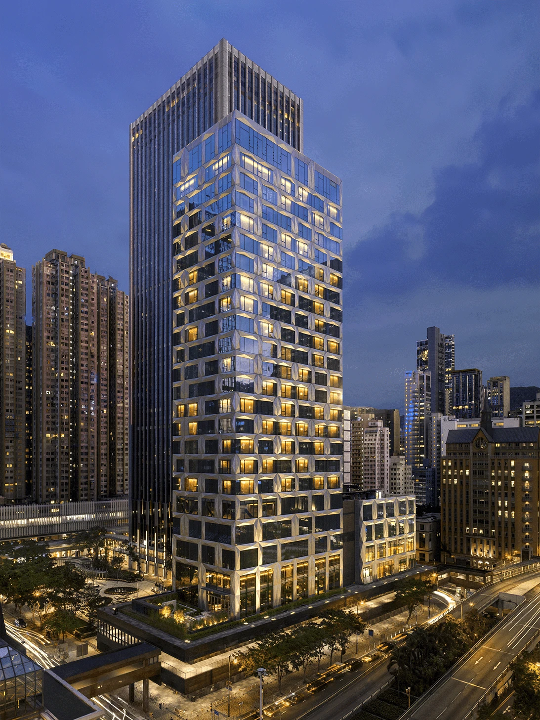Exterior view of The St. Regis Hong Kong in Wan Chai which allows families of four to stay in double queen rooms.
