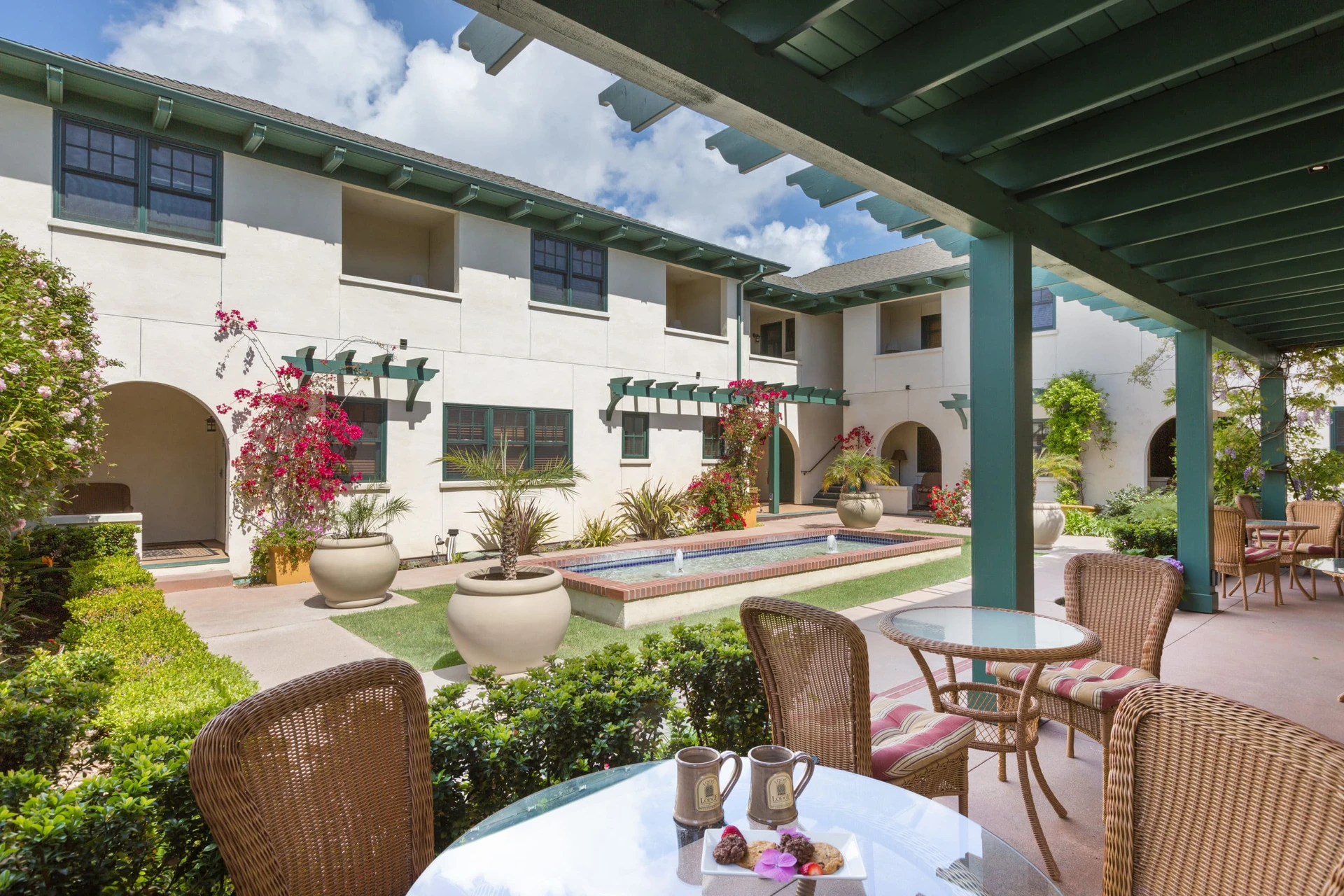 The breakfast area and courtyard at 1906 Lodge Coronado, a top Coronado San Diego hotel.