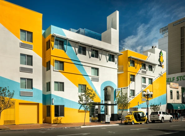 Hotel Z San Diego's blue, white, and orange-yellow exterior.