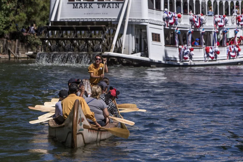 Riders paddle during Davy Crockett's Explorer Canoes