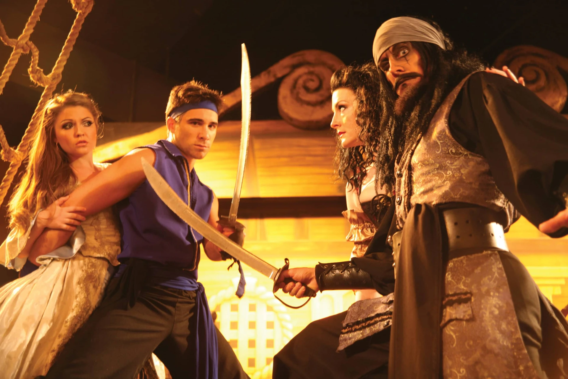 Actors in costume at Pirate's Dinner Adventure, a popular activity near Anaheim for kids.