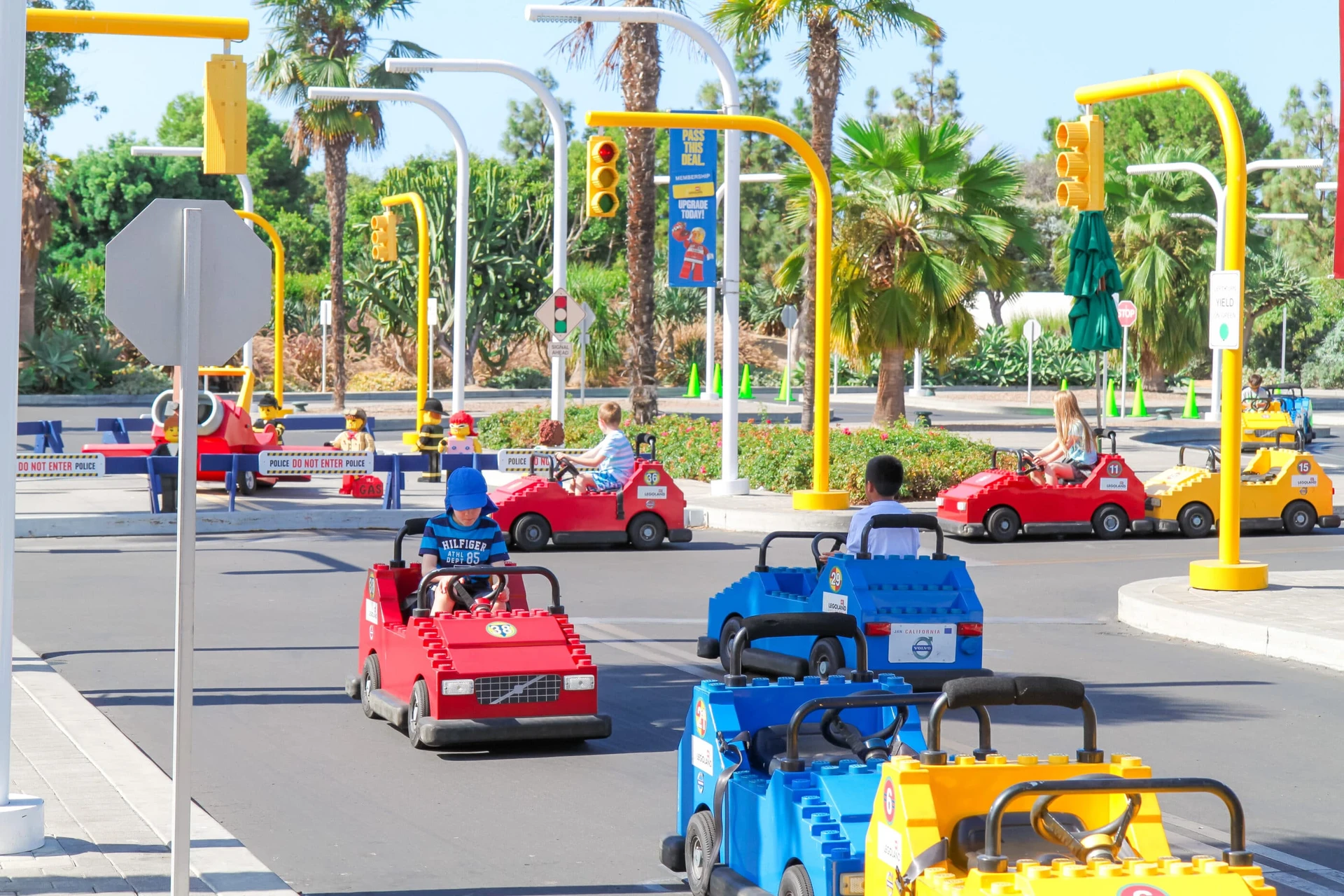 Kids drive LEGO cars at LEGOLAND California in San Diego.