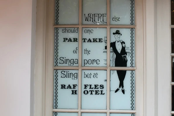 Singapore Sling signage at the Raffles Hotel in Singapore.