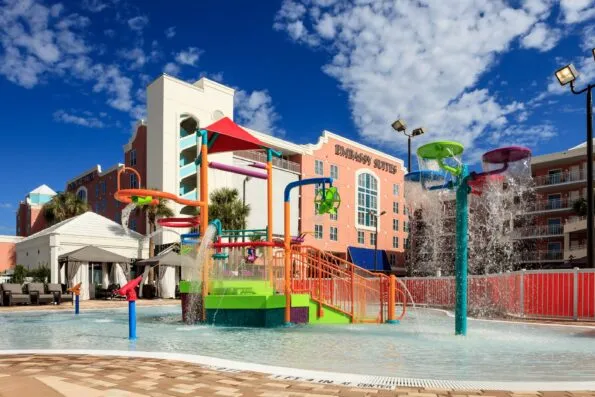 The fun, colorful kids' splash pad and water play area at Embassy Suites by Hilton Orlando.