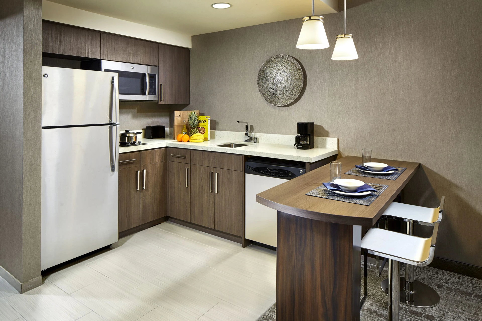The full kitchen inside Homewood Suites by Hilton San Diego Downtown Bayside