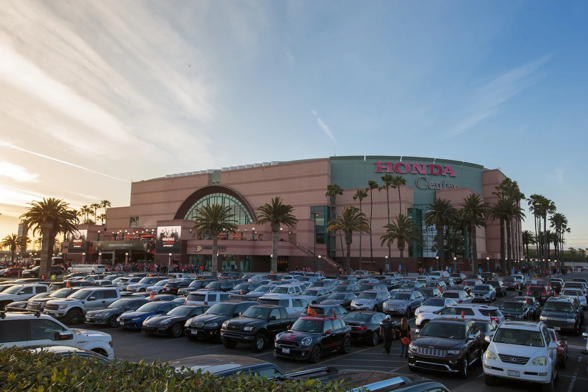 Exterior view over the parking lot to the entrance of the Honda Center in Anaheim.