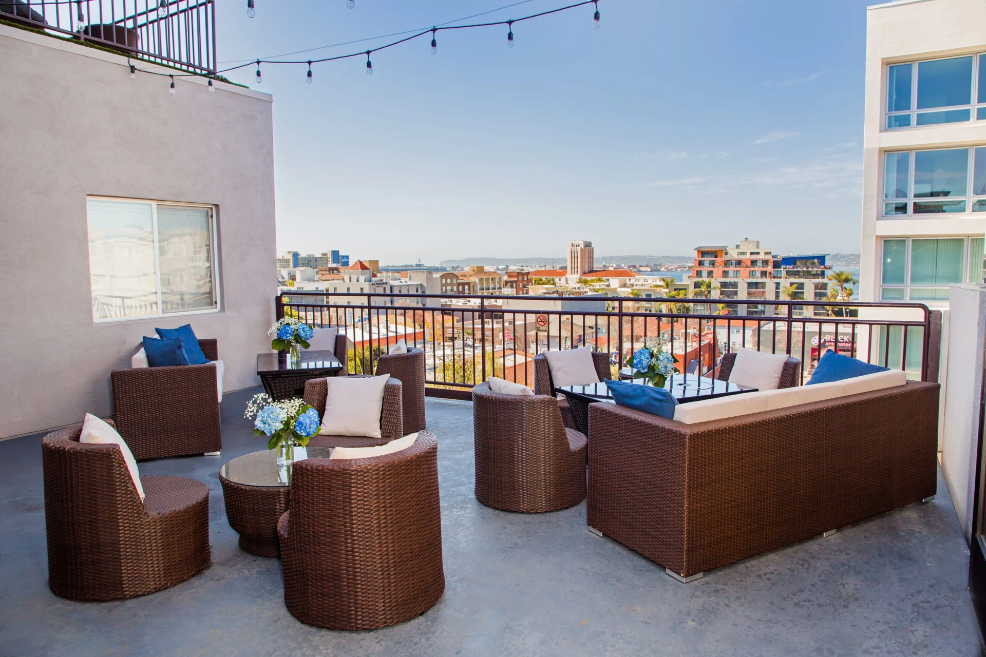 Outdoor terrace at Porto Vista Hotel overlooking Little Italy.